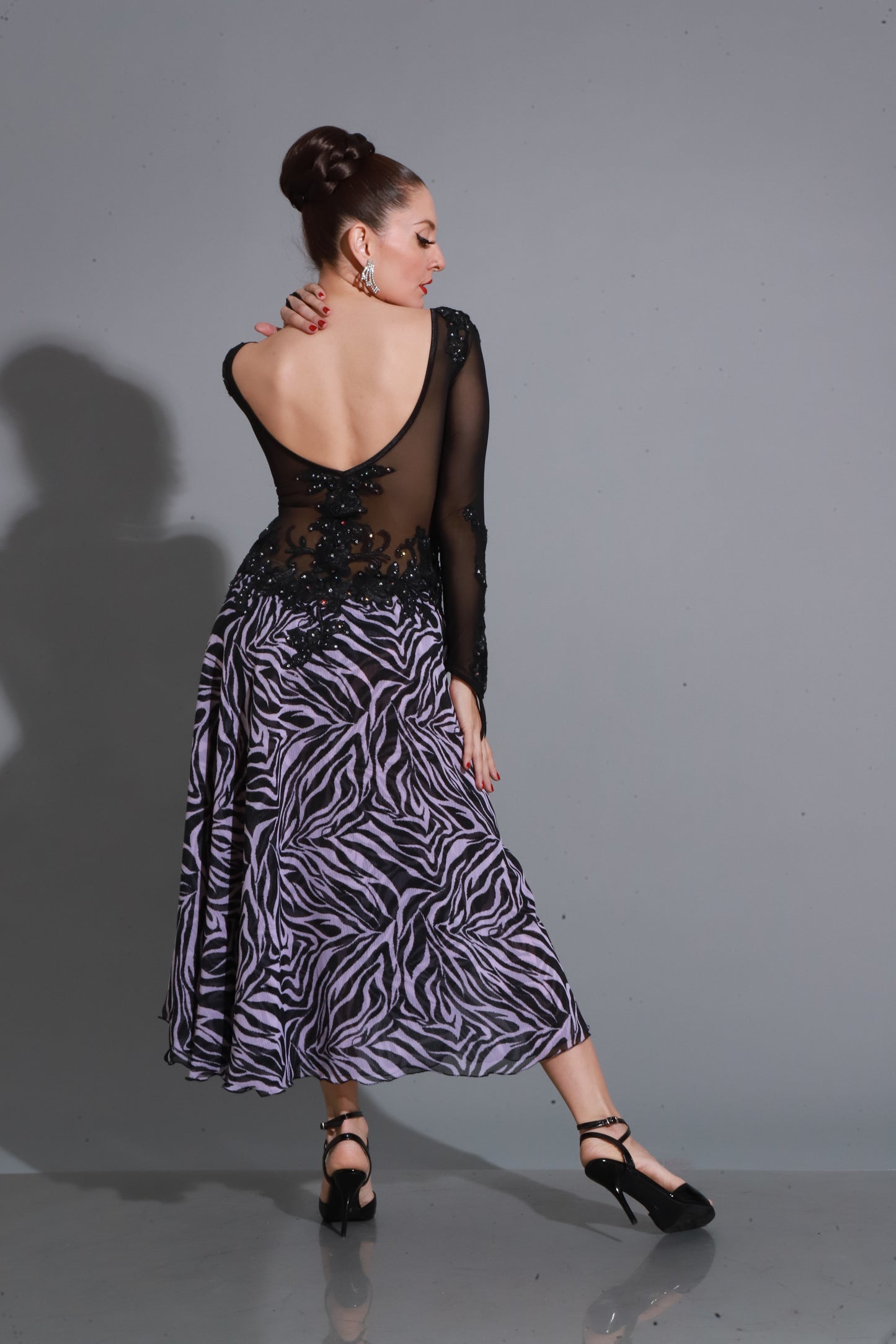 Black tulle and lace with shimmering embroidery and side slit — sophisticated, elegant, and sensual.