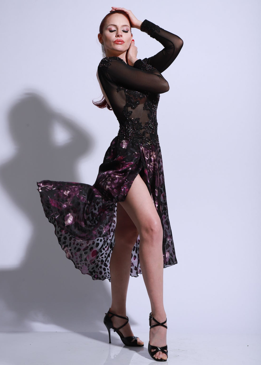 Stage tango dress with black embroidered lace bodice, sheer sleeves and printed satin skirt in burgundy and black tones.