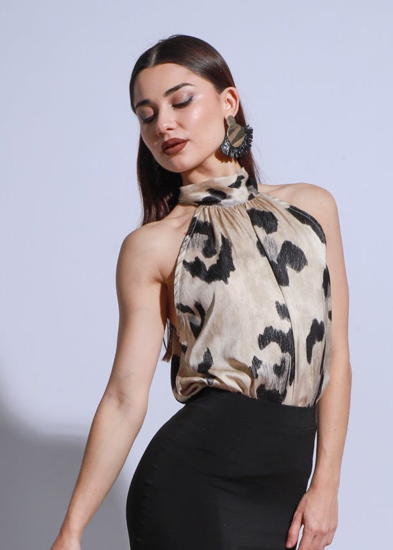 Animal-print tango top with high neckline, draped front and soft silky fabric.