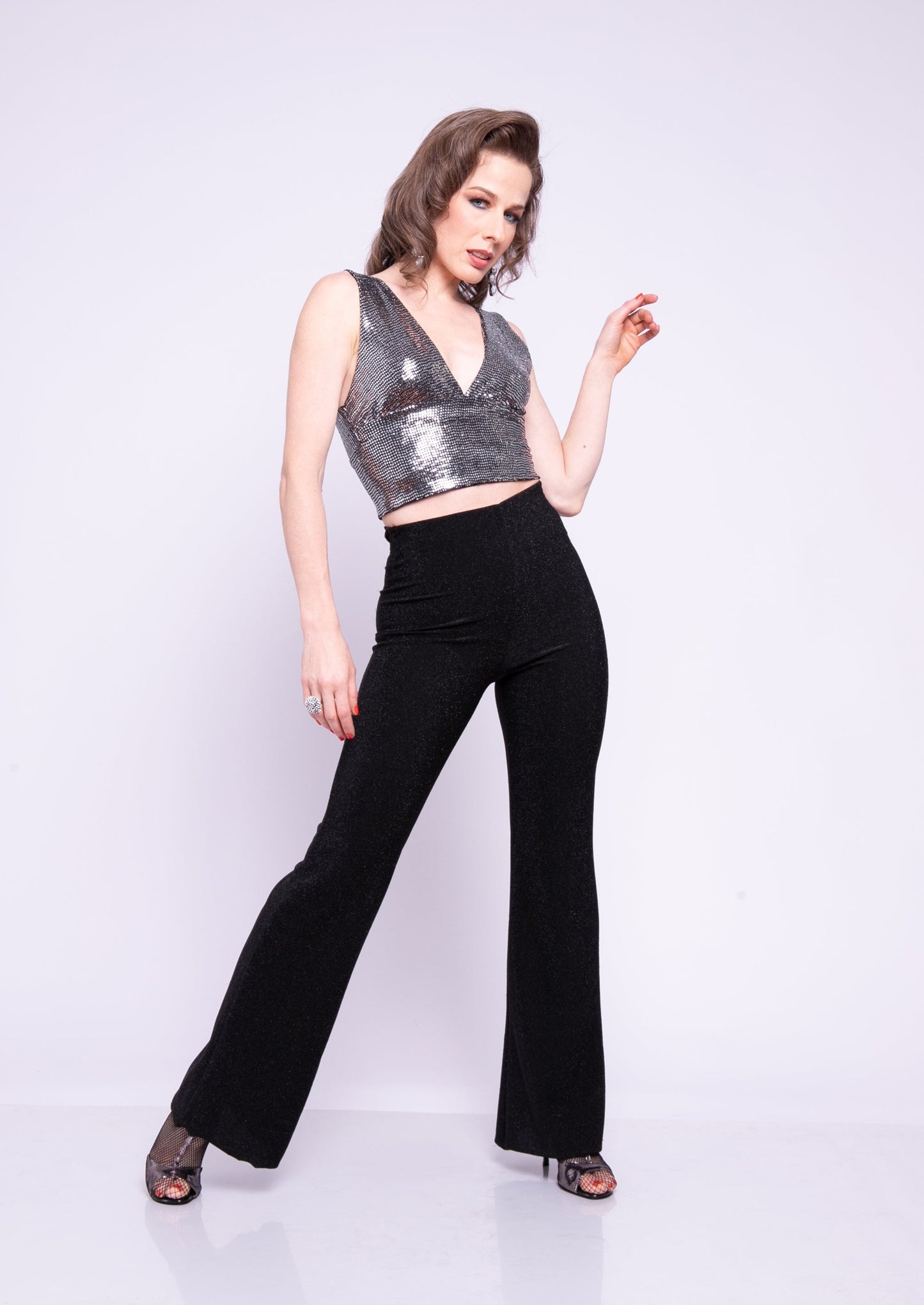 Black tango palazzo pants with a high waistband and wide flowing legs. ML378